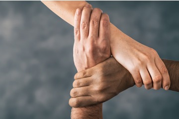 top-view-of-holding-hands-concept-of-unity-teamwork-and-support-picture 360 x 240